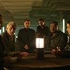 Roger Cross, Amanda Brugel, Anthony Lemke, Rob Stewart, Marc Bendavid, and Alex Mallari Jr. in Dark Matter (2015)