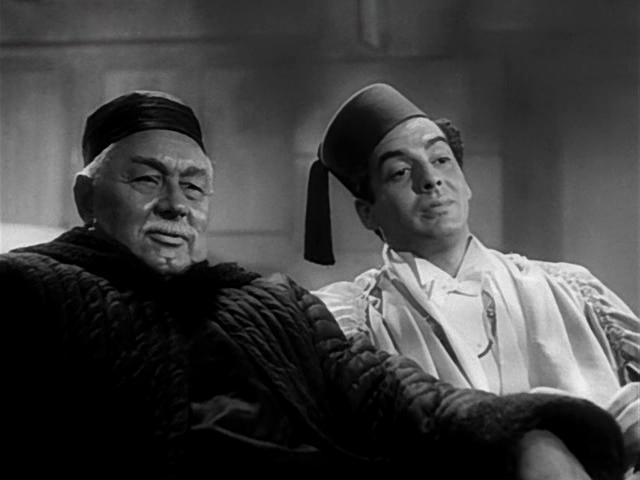 Victor Mature and Clyde Fillmore in The Shanghai Gesture (1941)