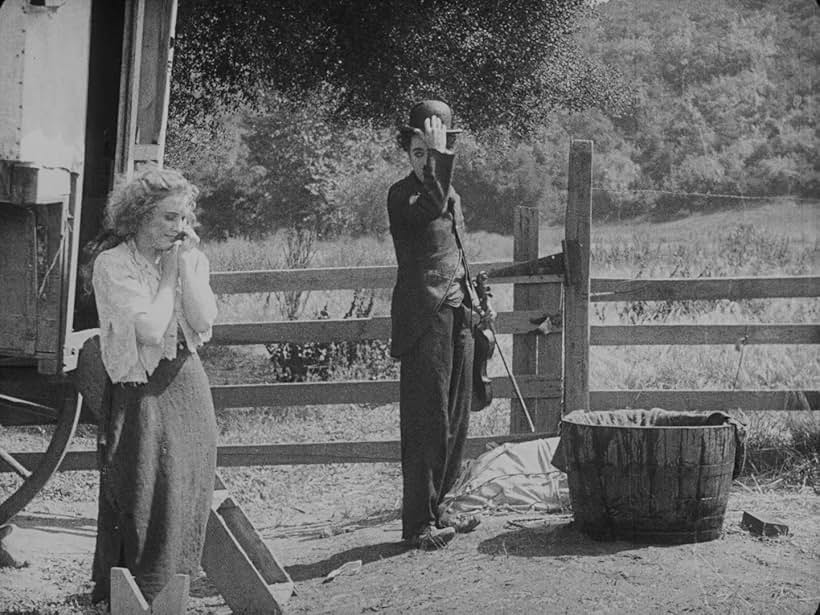 Charles Chaplin and Edna Purviance in The Vagabond (1916)