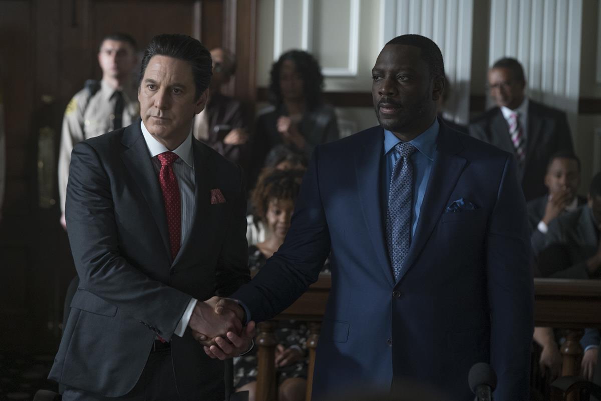 Adewale Akinnuoye-Agbaje and Scott Cohen in The Fix (2019)