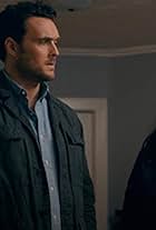 Owain Yeoman and Allison Tolman in No Outlet (2019)