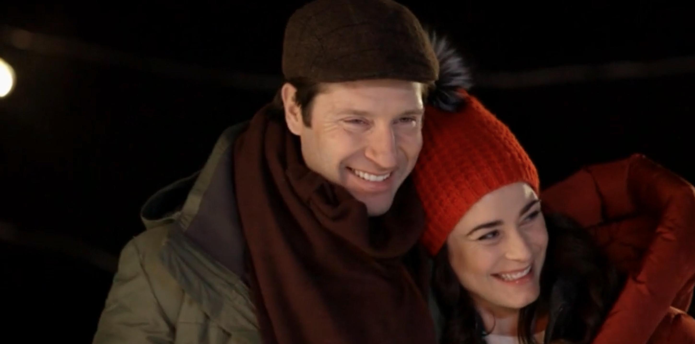 Damon Runyan and Elysia Rotaru in A Snowy Christmas (2021)