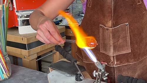 Lindsay B. Field creating her blown glass ornaments in real time.