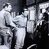 James Arness, Elisha Cook Jr., and Dennis Weaver in Gunsmoke (1955)