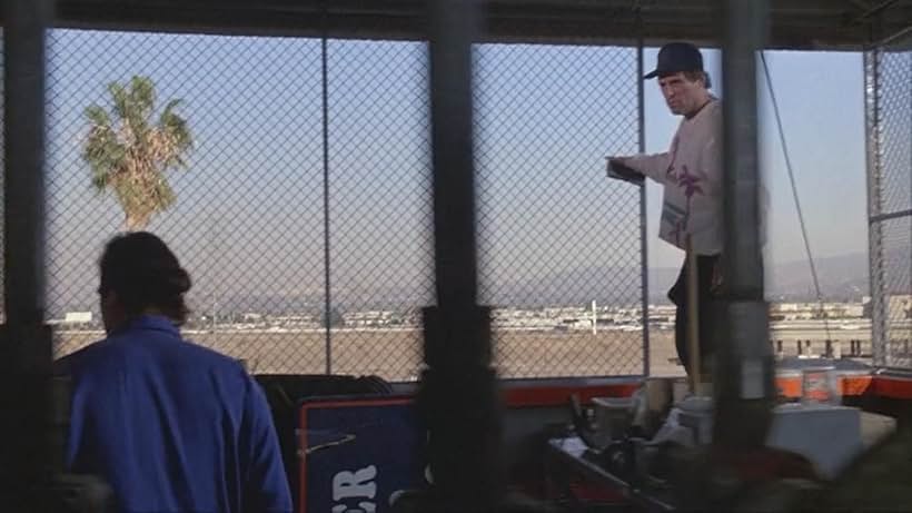 Jim Belushi and Charles Grodin in Taking Care of Business (1990)