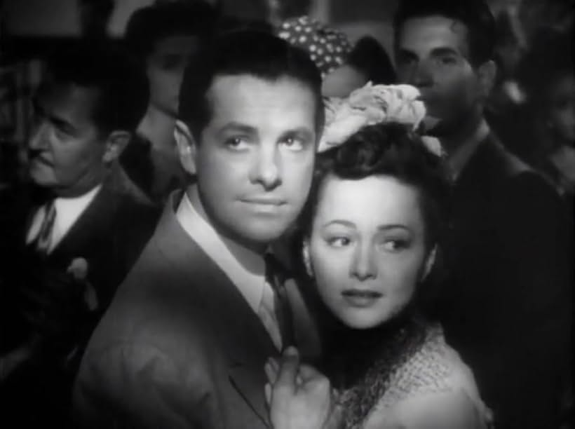 Olivia de Havilland and Robert Cummings in Princess O'Rourke (1943)