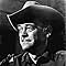 John McIntire in Two Rode Together (1961)