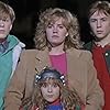 Elisabeth Shue, Maia Brewton, Keith Coogan, and Anthony Rapp in Adventures in Babysitting (1987)