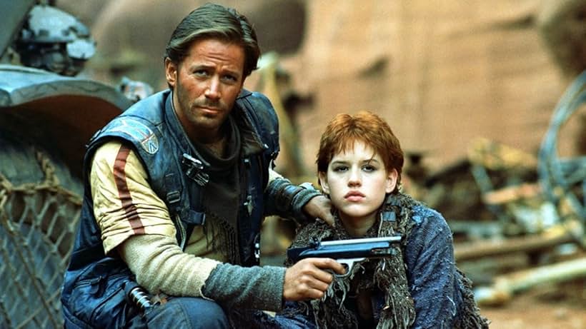 Molly Ringwald and Peter Strauss in Spacehunter: Adventures in the Forbidden Zone (1983)