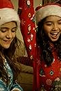 Christine Lee, Reilly Jacquemin, Prymrr, and Deja Cruz in Santa Claus Is Coming to Town (2018)