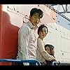 Kim Su-an, Gong Yoo, and Jung Yu-mi in Busanhaeng (2016)