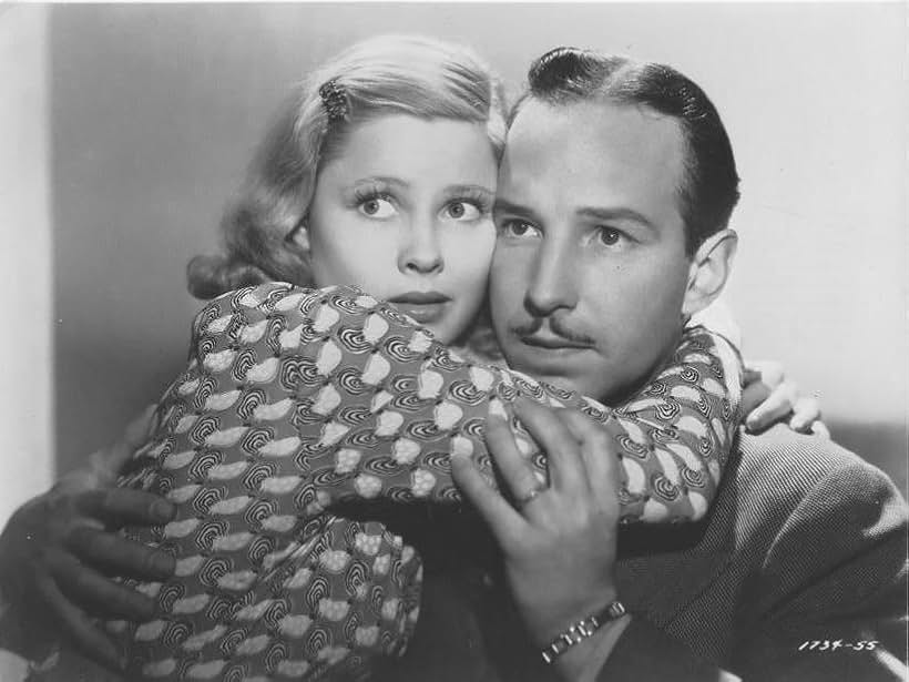 Mary Carlisle and Lloyd Nolan in Hunted Men (1938)