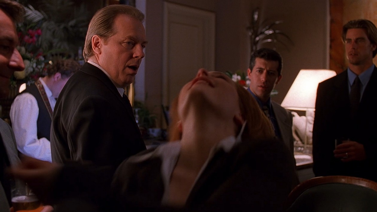 Gillian Anderson and Michael McKean in Three of a Kind (1999)