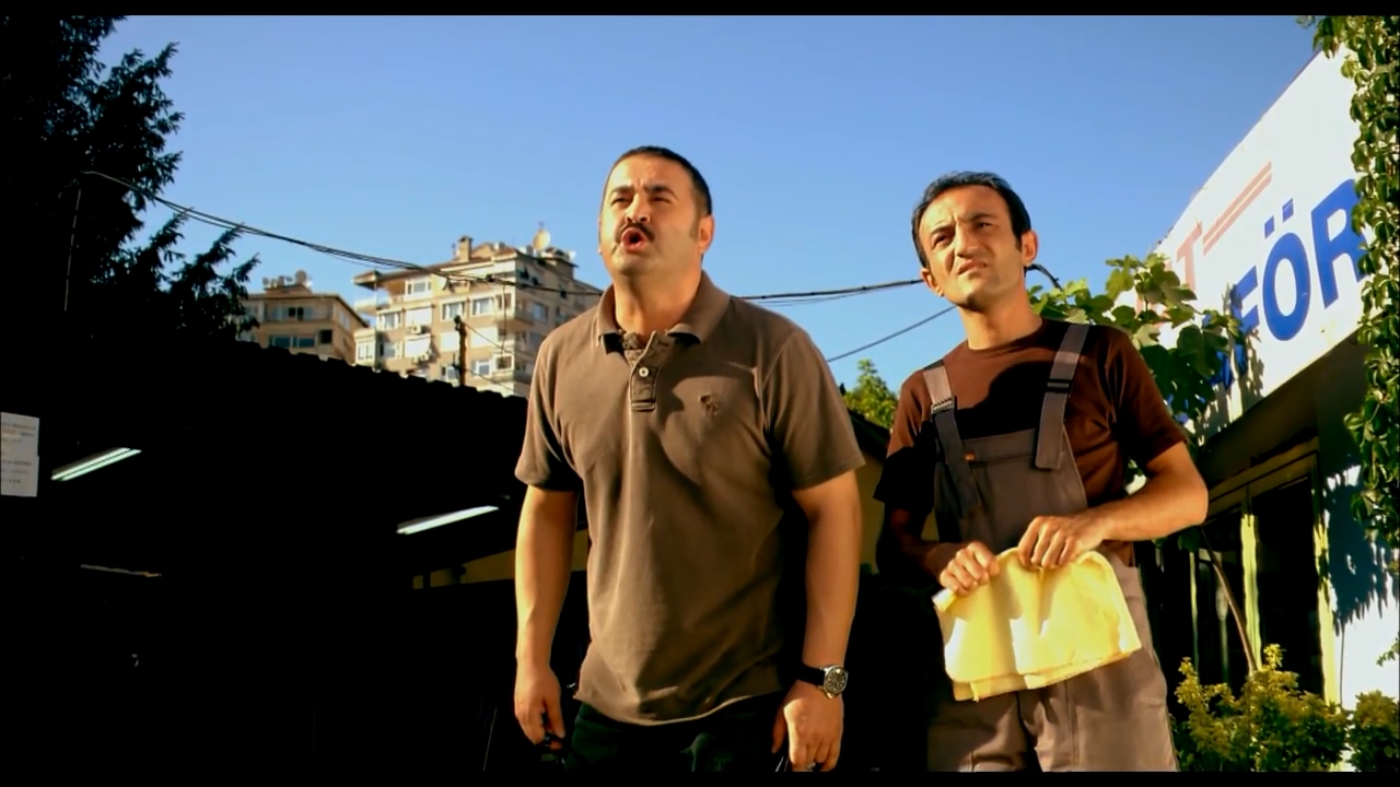 Safak Sezer and Ersin Korkut in Sacred Demijohn (2007)