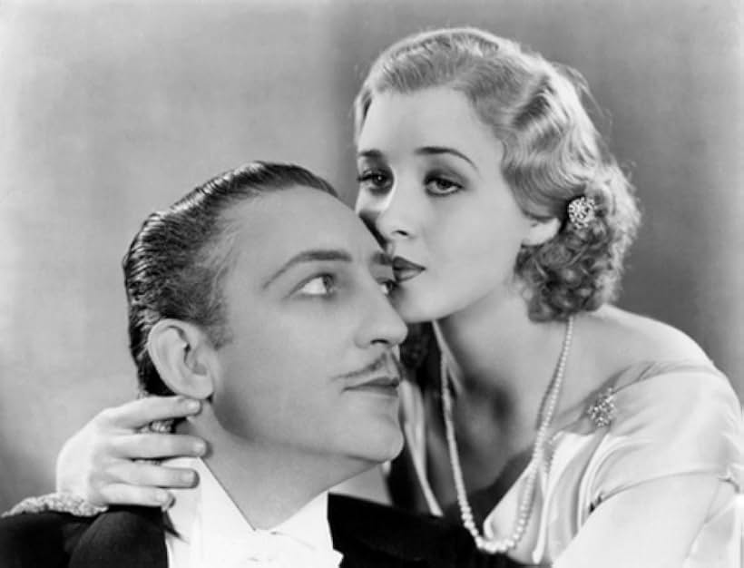 Marian Marsh and Warren William in Beauty and the Boss (1932)