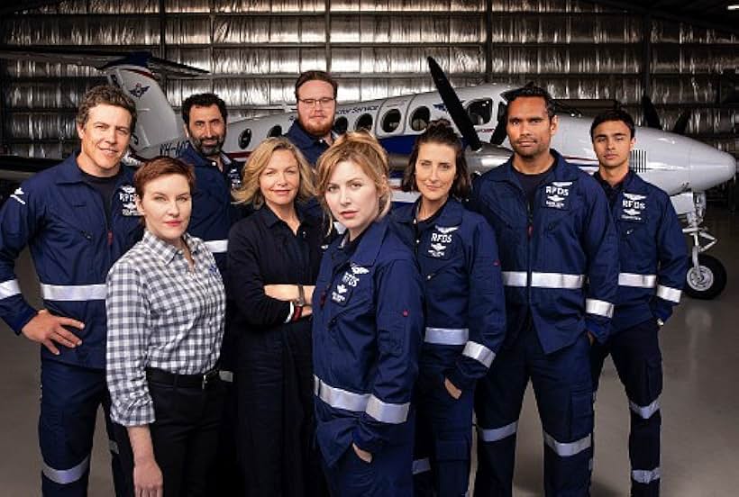 Rodney Afif, Justine Clarke, Kate Mulvany, Ash Ricardo, Stephen Peacocke, Emma Hamilton, Rob Collins, and Sofia Nolan in RFDS (2021)