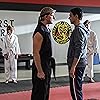 Ralph Macchio, William Zabka, Aedin Mincks, Xolo Maridueña, and Owen Morgan in Cobra Kai (2018)