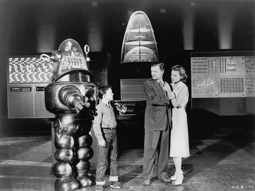 Philip Abbott, Diane Brewster, Richard Eyer, and Robby the Robot in The Invisible Boy (1957)