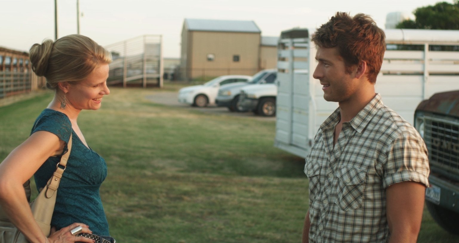 Joelle Carter and Glen Powell in Red Wing (2013)