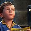 Tom Hanks, Daryl Sabara, and Josh Hutcherson in The Polar Express (2004)