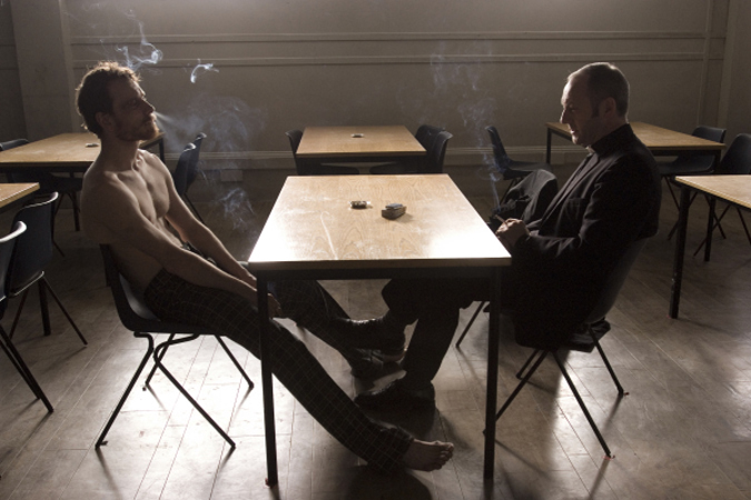 Liam Cunningham and Michael Fassbender in Hunger (2008)