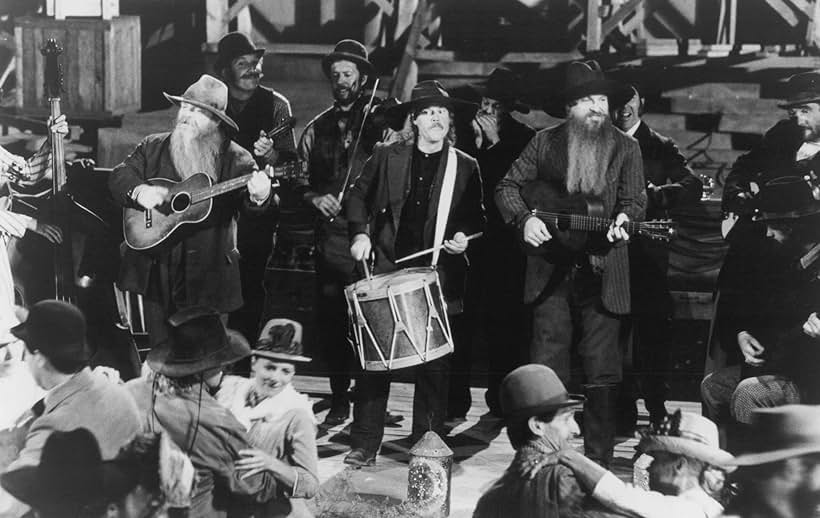 Frank Beard, Billy Gibbons, Dusty Hill, and ZZ Top in Back to the Future Part III (1990)