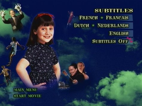 Embeth Davidtz, Jon Lovitz, Kiami Davael, Pam Ferris, and Mara Wilson in Matilda (1996)