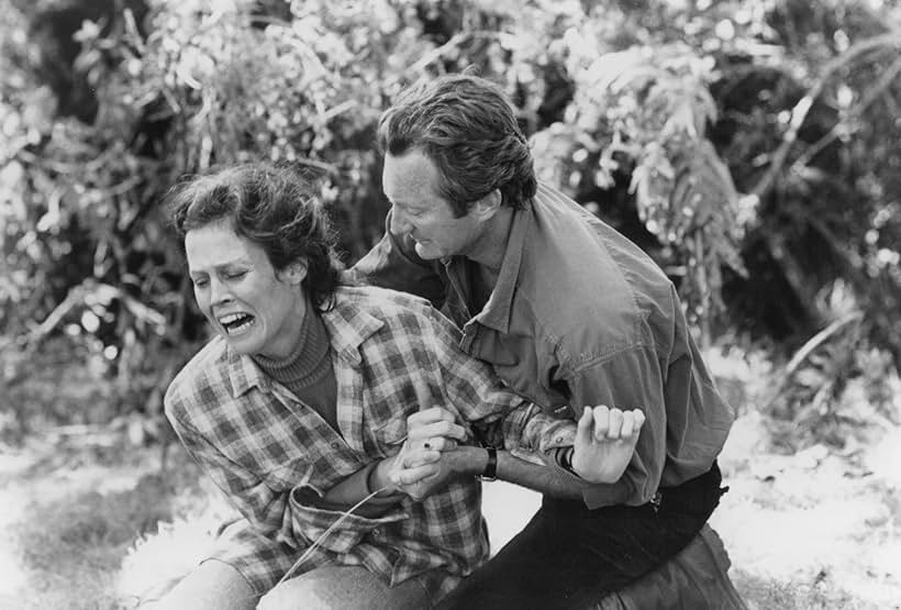 Sigourney Weaver and Bryan Brown in Gorillas in the Mist (1988)