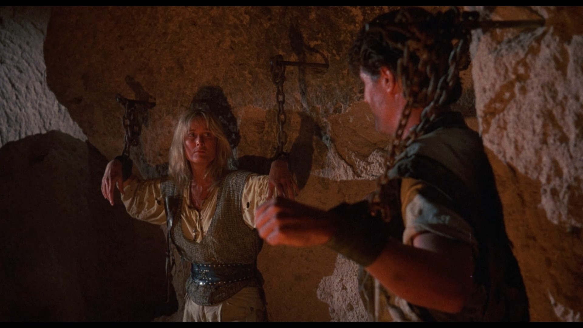 Garrick Dowhen and Deborah Rennard in Land of Doom (1986)