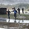 Richard Armitage, Arlen Escarpeta, Nathan Kress, Jeremy Sumpter, Matt Walsh, and Sarah Wayne Callies in Into the Storm (2014)