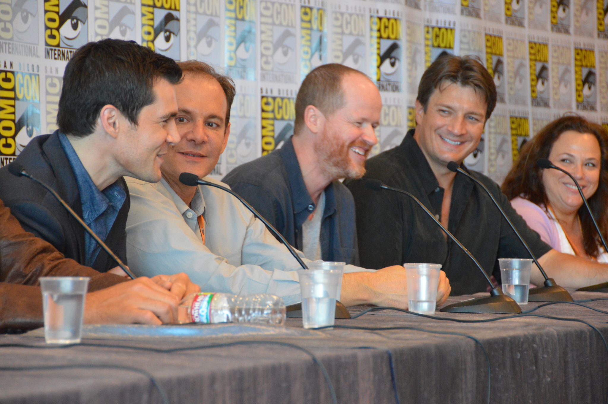 Nathan Fillion, Sean Maher, Tim Minear, and Joss Whedon at an event for Firefly (2002)