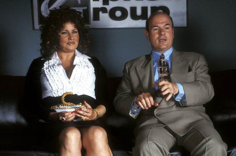 Jennifer Coolidge and Larry Miller in A Mighty Wind (2003)