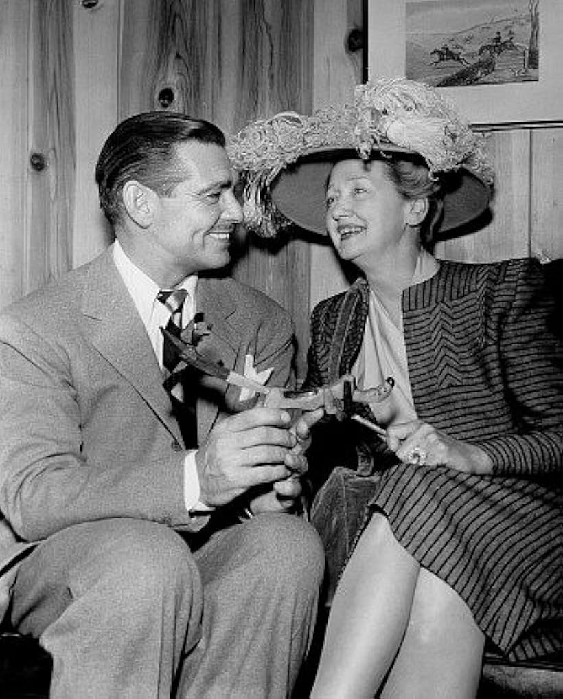 Clark Gable and Hedda Hopper during the filming of "Huckster, The." 1947 MGM