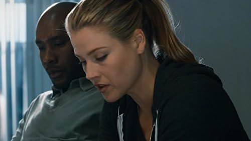 Morris Chestnut and Ali Larter in Legends (2014)