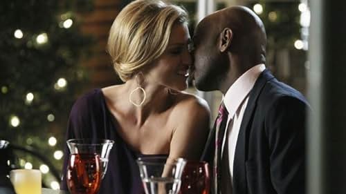 Romany Malco and Tricia Helfer in No Ordinary Family (2010)