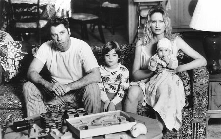 John Travolta, Kelly Lynch, and Andrew Lawrence in White Man's Burden (1995)