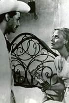 Michèle Morgan and Víctor Manuel Mendoza in The Proud and the Beautiful (1953)