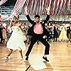 John Travolta, Olivia Newton-John, Annette Charles, and Didi Conn in Grease (1978)