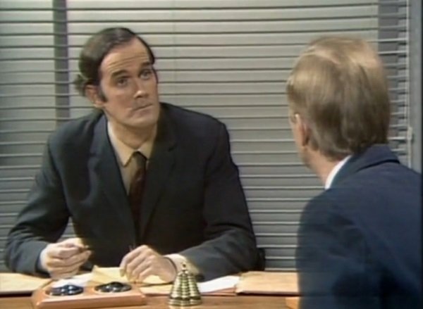 John Cleese in How to Irritate People (1969)