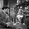 John McCallum and Googie Withers in It Always Rains on Sunday (1947)