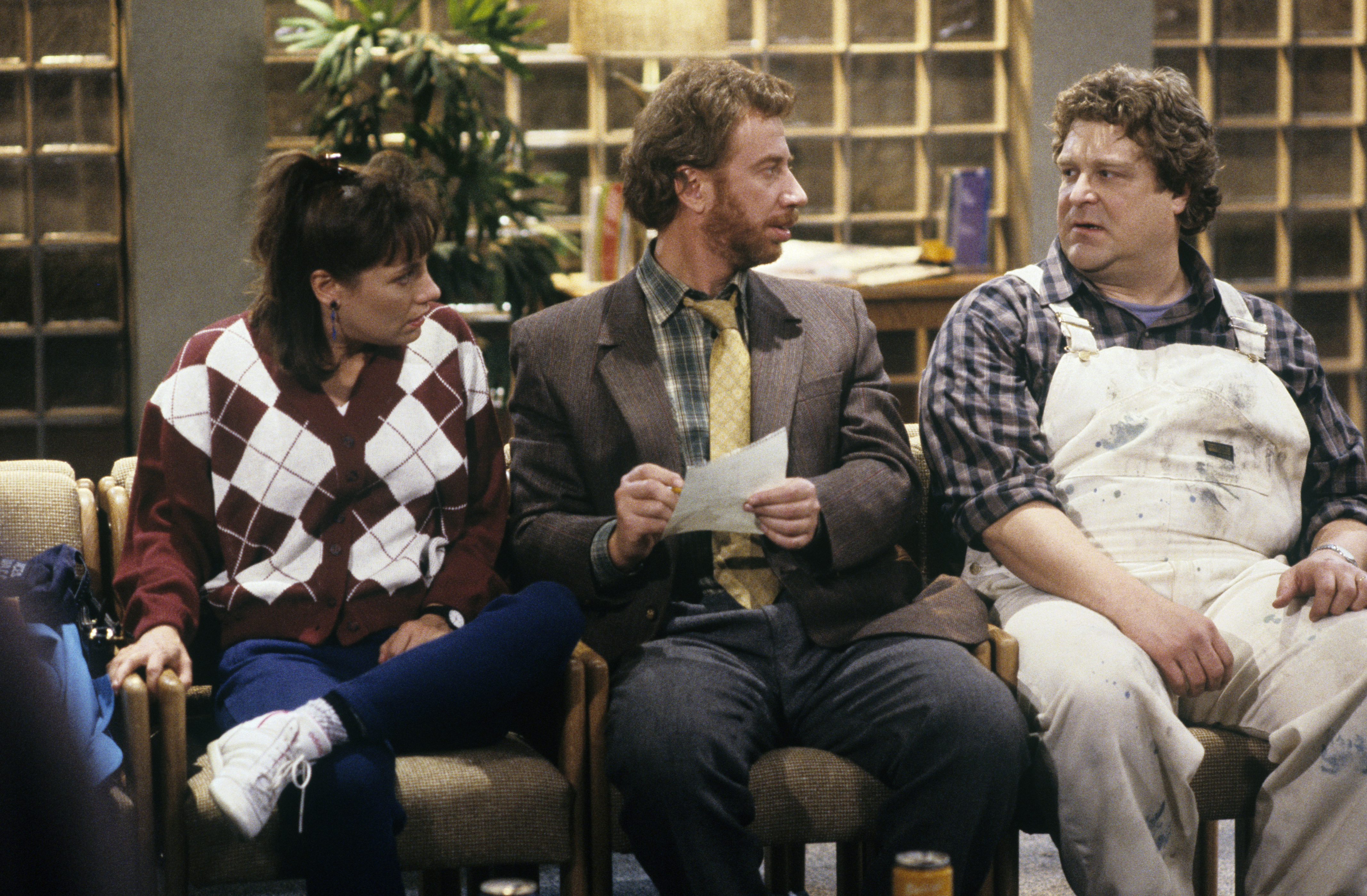 John Goodman, Elya Baskin, and Laurie Metcalf in Roseanne (1988)