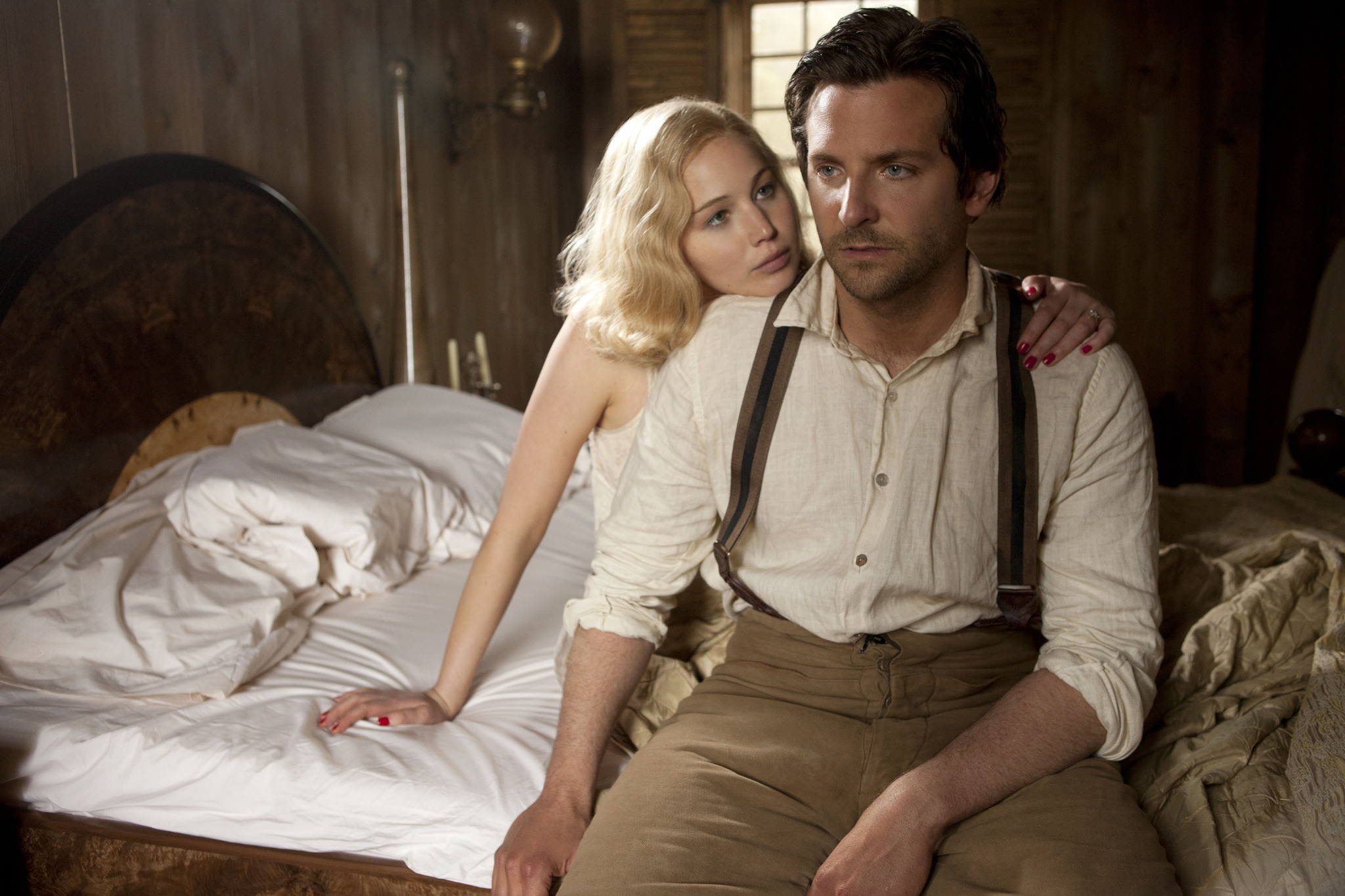 Bradley Cooper and Jennifer Lawrence in Serena (2014)