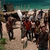 Naveen Andrews, Daniel Dae Kim, Emilie de Ravin, Matthew Fox, Jorge Garcia, Josh Holloway, Yunjin Kim, Dominic Monaghan, Terry O'Quinn, Harold Perrineau, Maggie Grace, Malcolm David Kelley, and Evangeline Lilly in Lost (2004)