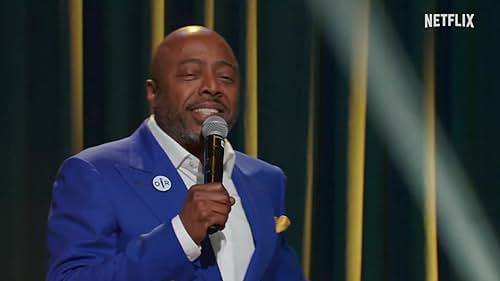 Donnell Rawlings discusses relationships, travel, aging and parenting while wearing a blue suit, red socks and moisturized ankles.