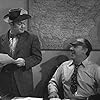 Leo Gorcey and Tim Ryan in News Hounds (1947)