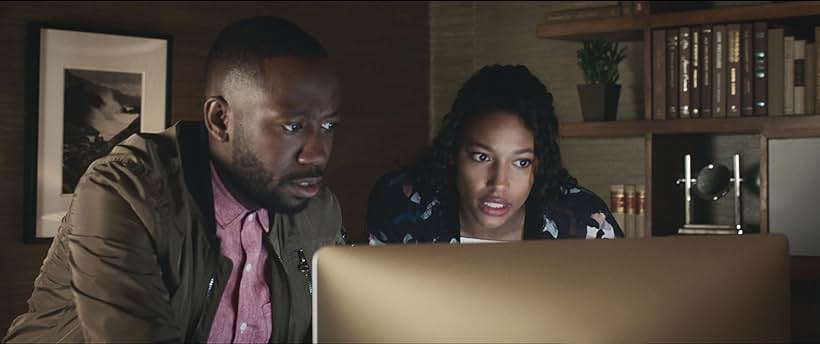 Lamorne Morris and Kylie Bunbury in Game Night (2018)