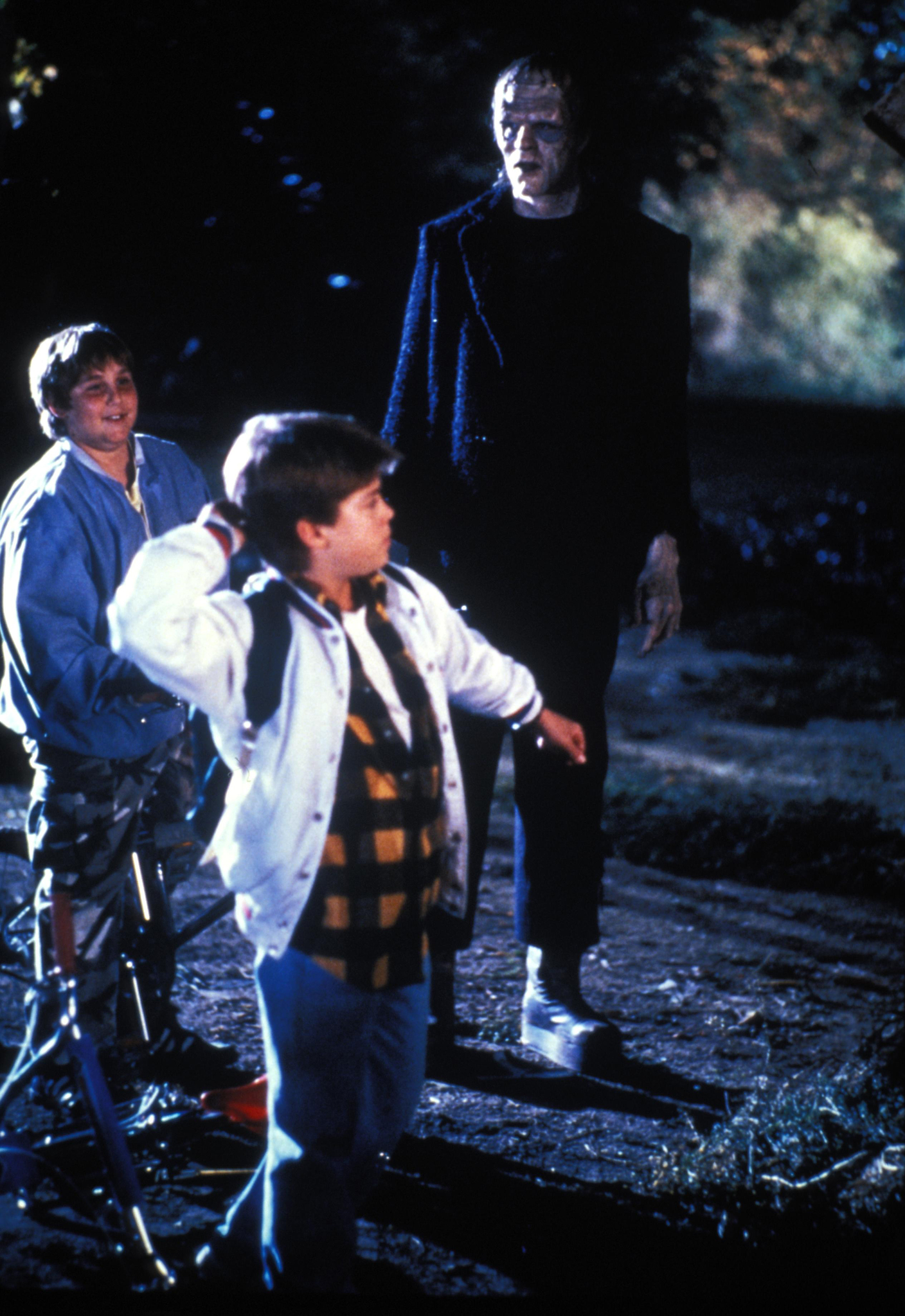 Tom Noonan, Brent Chalem, and Andre Gower in The Monster Squad (1987)