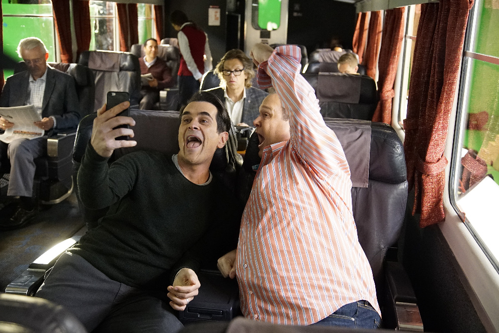 Ty Burrell, Eric Stonestreet, and Simon Templeman in Modern Family (2009)