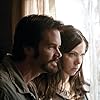 Garret Dillahunt and Riki Lindhome in The Last House on the Left (2009)