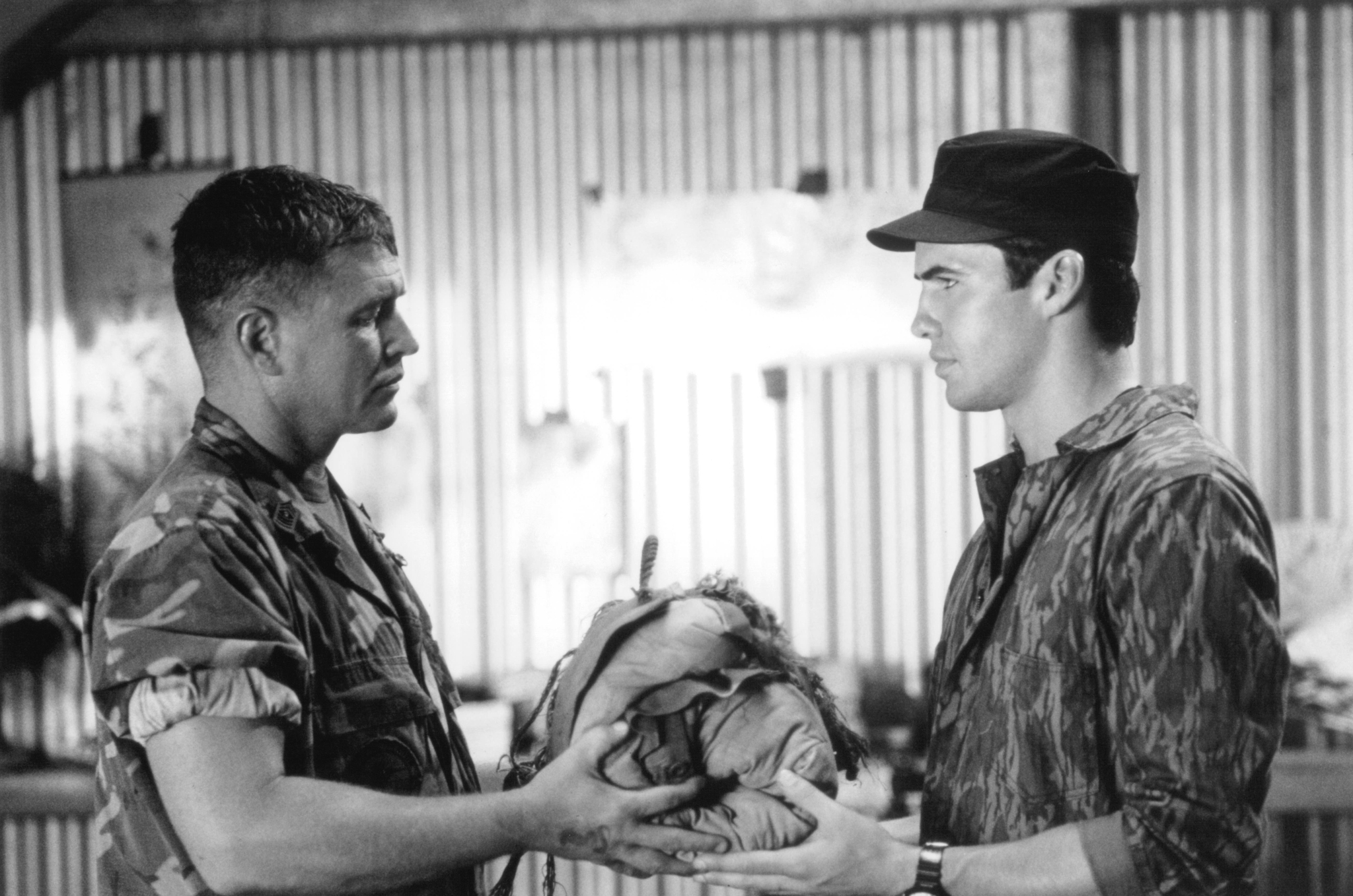 Tom Berenger and Billy Zane in Sniper (1993)